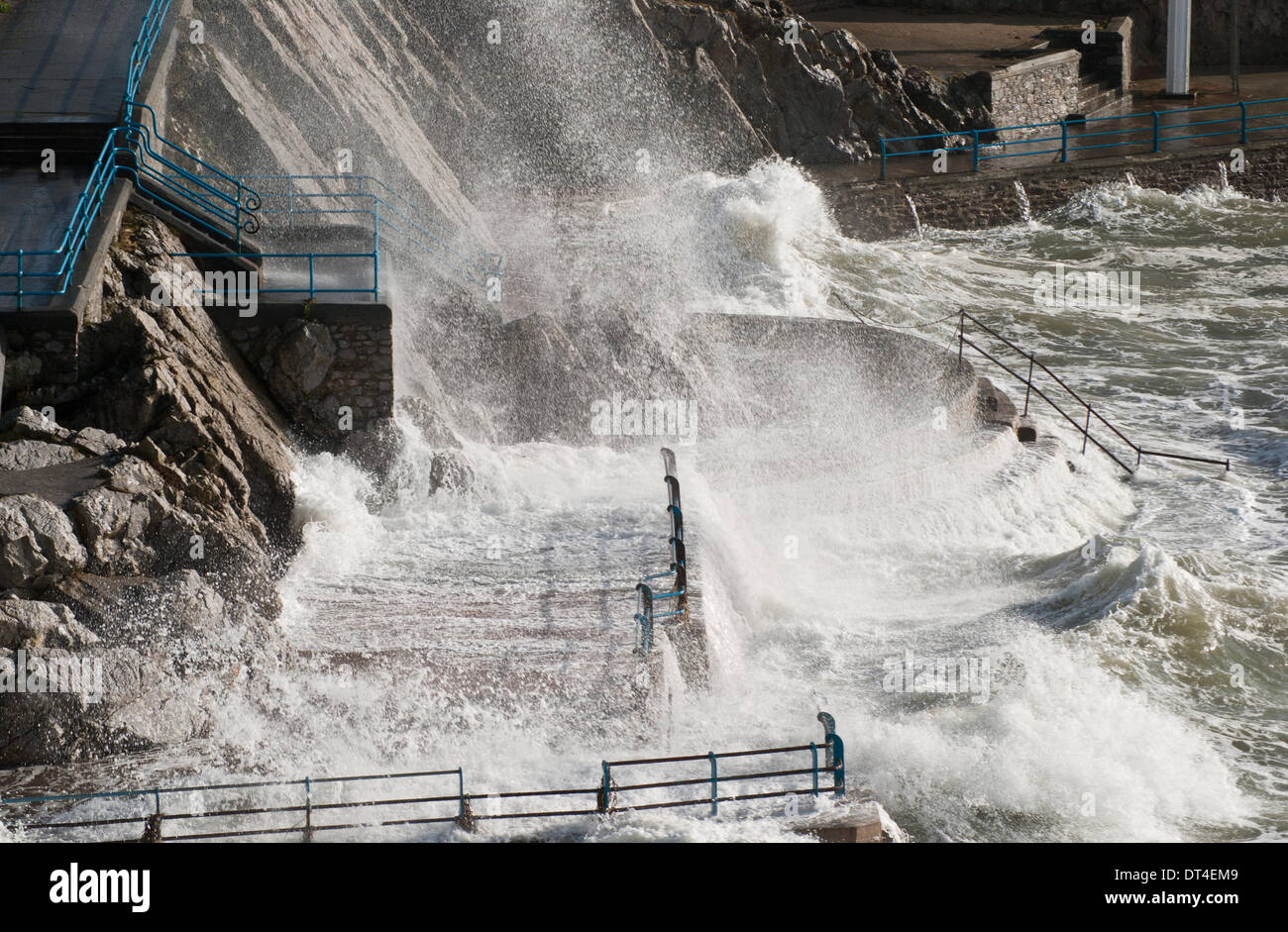 Plymouth, Devon, UK. 8th February 2014. Plymouth Hoe, England during strong winds. The waves crash over pedestrian walkways and paths. Credit:  Anna Stevenson/Alamy Live News Stock Photo