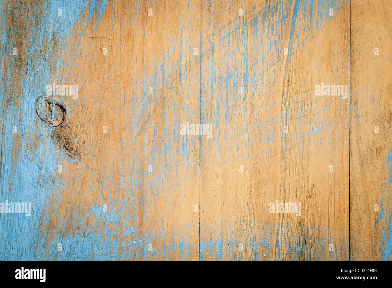 painted and scratch wood texture background - old cutting board with bread crumbs Stock Photo