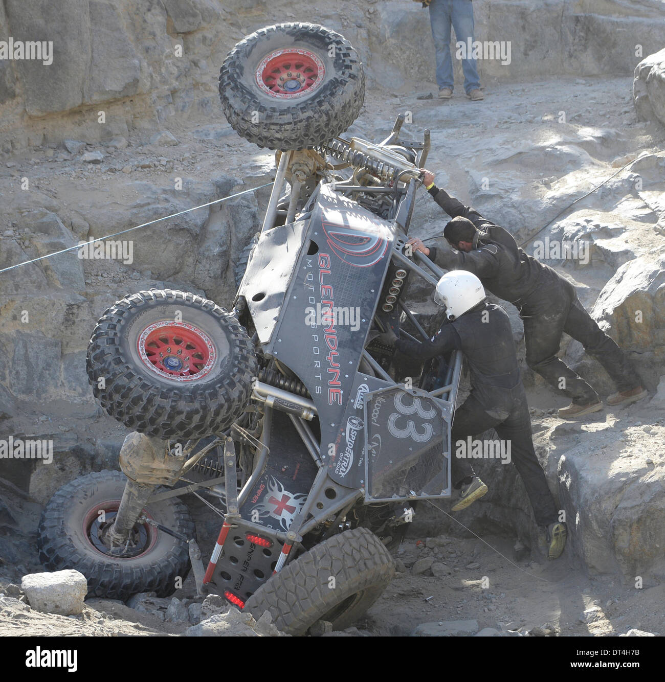 Feb 7, 2014. Johnson Valley CA. USA. One of many of the 156 off road race car flipping over on the race course during the 2014 King of the Hammers finals Friday. A estimated crowd of 40,000 plus off road fans came out for the event. Photo by Gene Blevins/LA DailyNews/ZumaPress (Credit Image: © Gene Blevins/ZUMAPRESS.com) Stock Photo