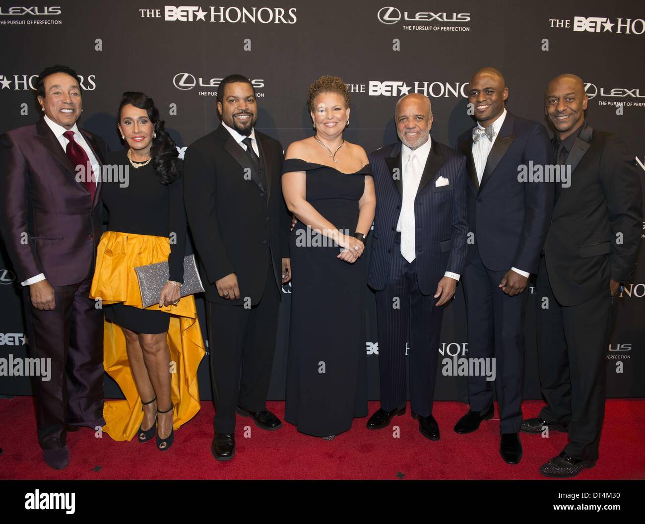 Washington, DC, USA. 8th Feb, 2014. SMOKEY ROBINSON and wife, ICE CUBE, DEBRA LEE, BERRY GORDY, WAYNE BRADY and STEPHEN G HILL, at the BET Honors which was held at the historic Warner Theater in Washington DC Credit:  Ricky Fitchett/ZUMAPRESS.com/Alamy Live News Stock Photo