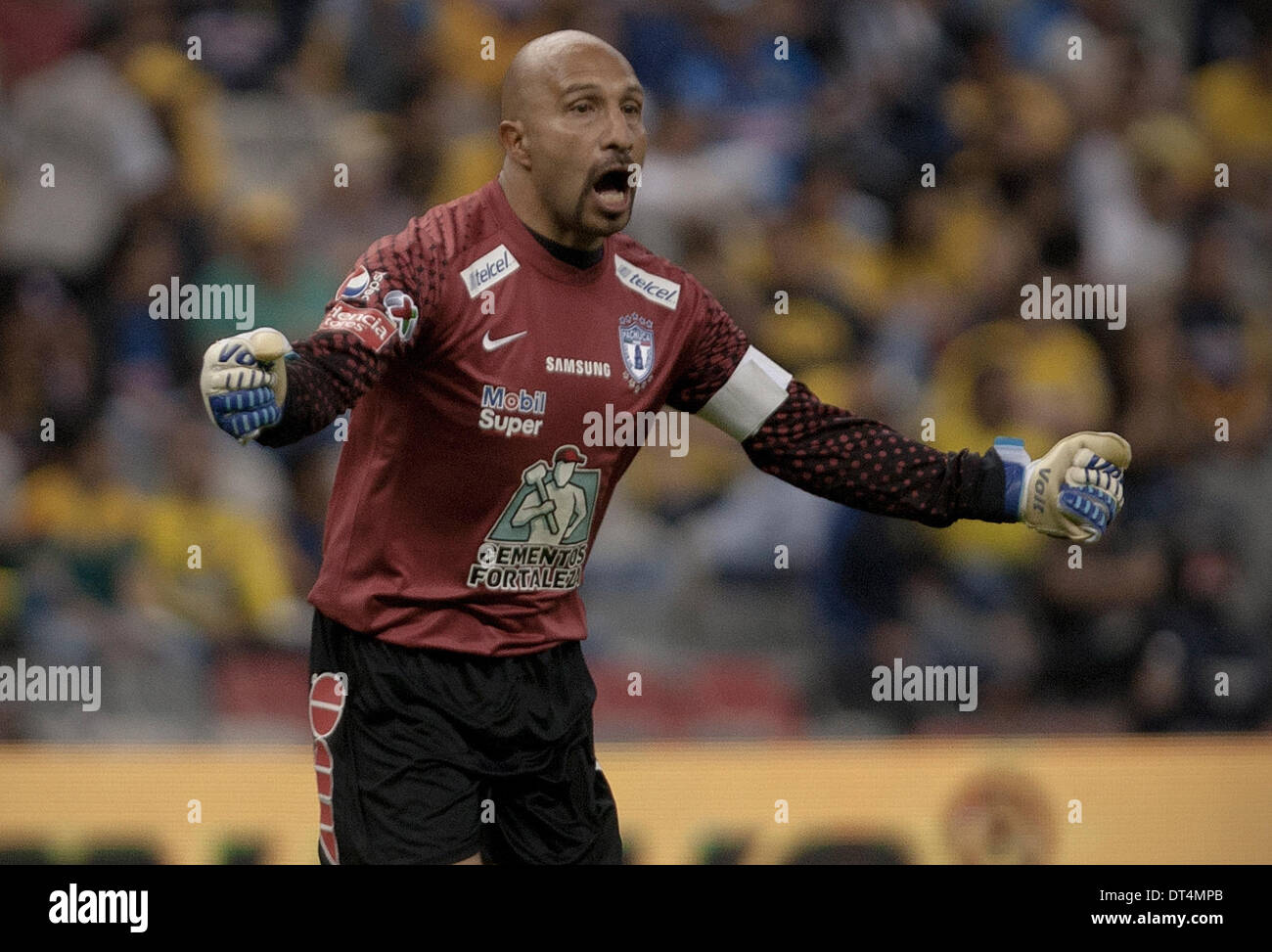 Mexico City, Mexico. 8th Feb, 2014. Goalkeeper Oscar Perez of Pachuca reacts during a Liga MX match against America at Azteca Stadium in Mexico City, capital of Mexico, on Feb. 8, 2014. Credit:  Alejandro Ayala/Xinhua/Alamy Live News Stock Photo