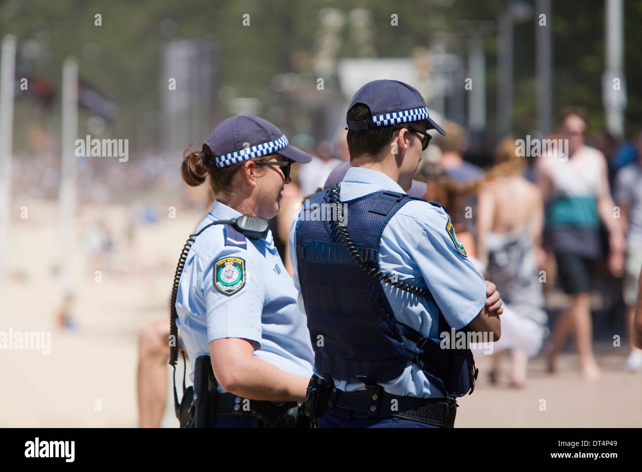 new south wales police officers patrolling in Manly during the australian open of surfing Stock Photo