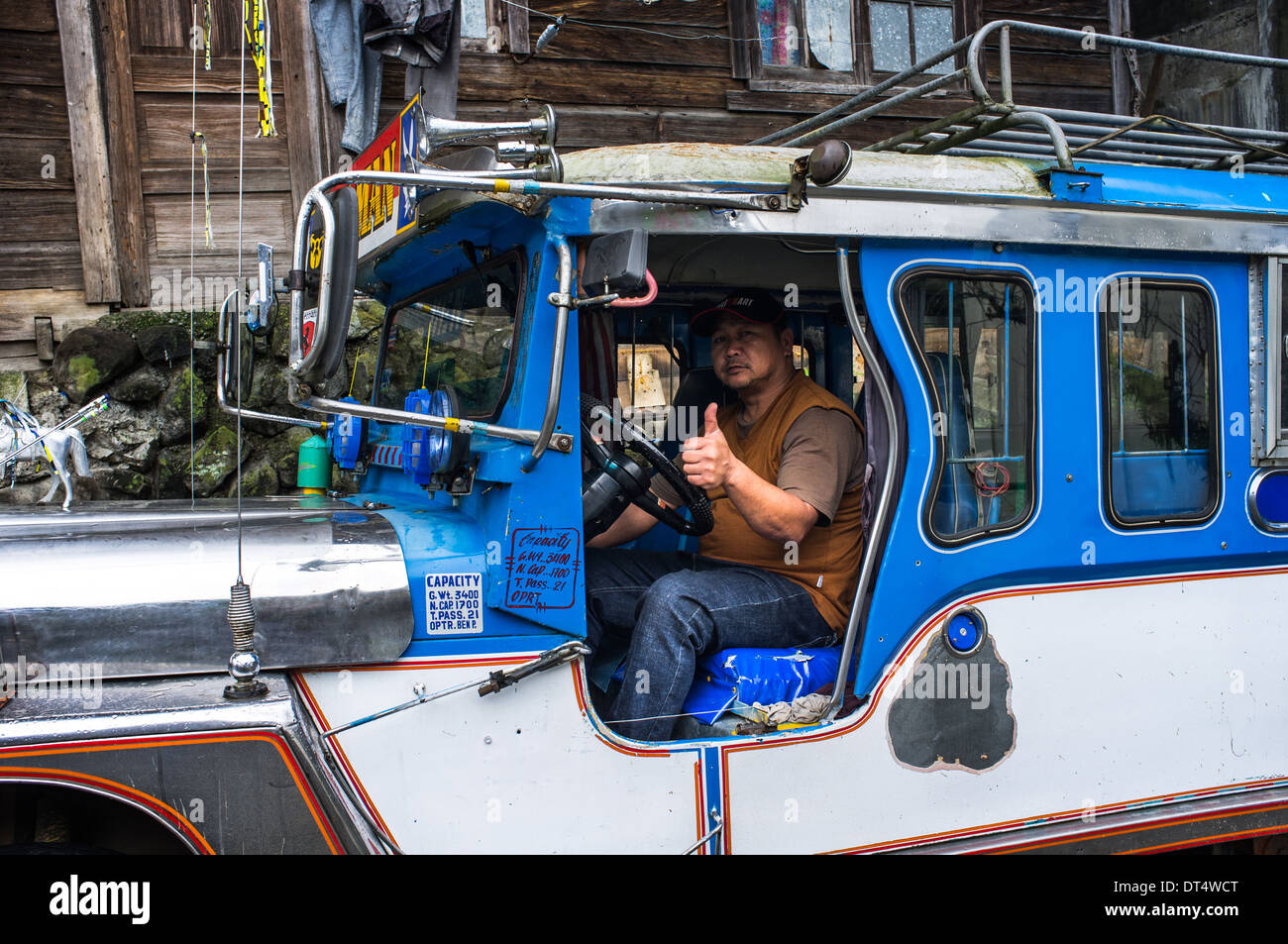 man sitting in a jeepney, philippines Stock Photo