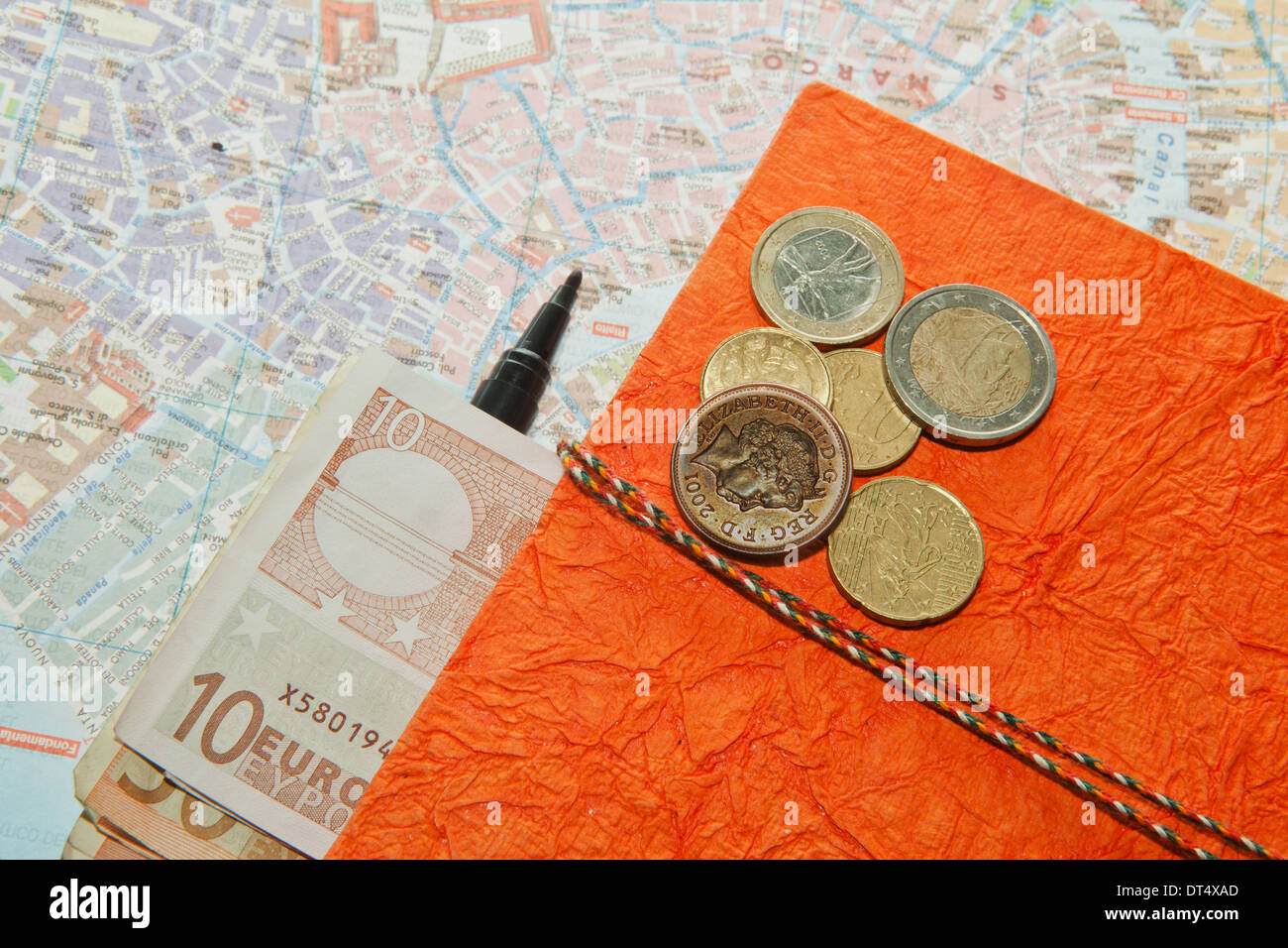 Travel Arrangement of Euro money, Map and notepad diary Journal Stock