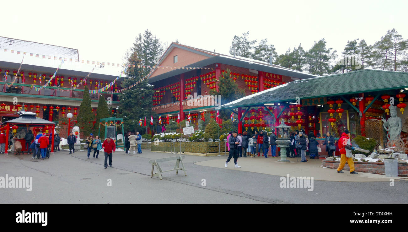 Believers visiting a Buddhist temple outside Toronto, Canada Stock Photo