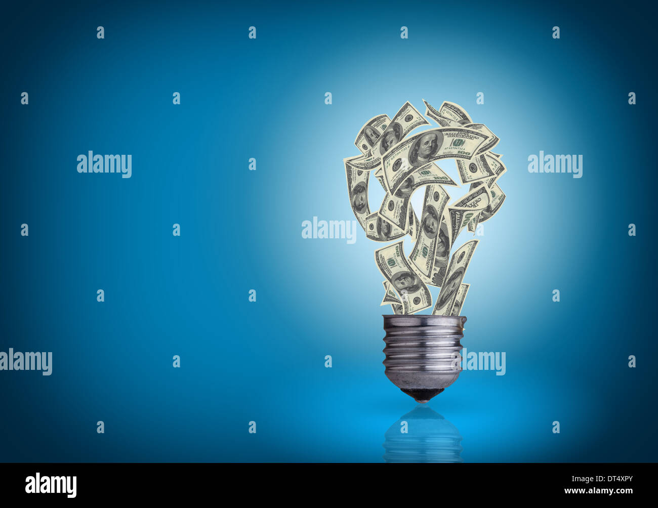 light bulb with money banknotes inside it on blue background Stock