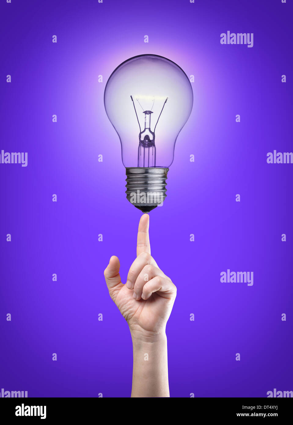 Light bulb on tip of finger Stock Photo Alamy