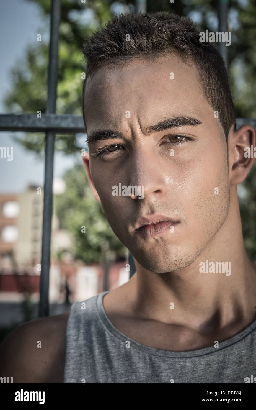 Sweaty young athlete playing basketball outdoors Stock Photo Alamy