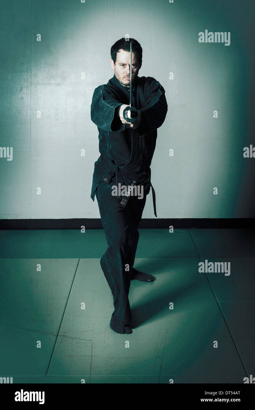 Man practicing martial arts Bujinkan, also known as Ninjitsu, England