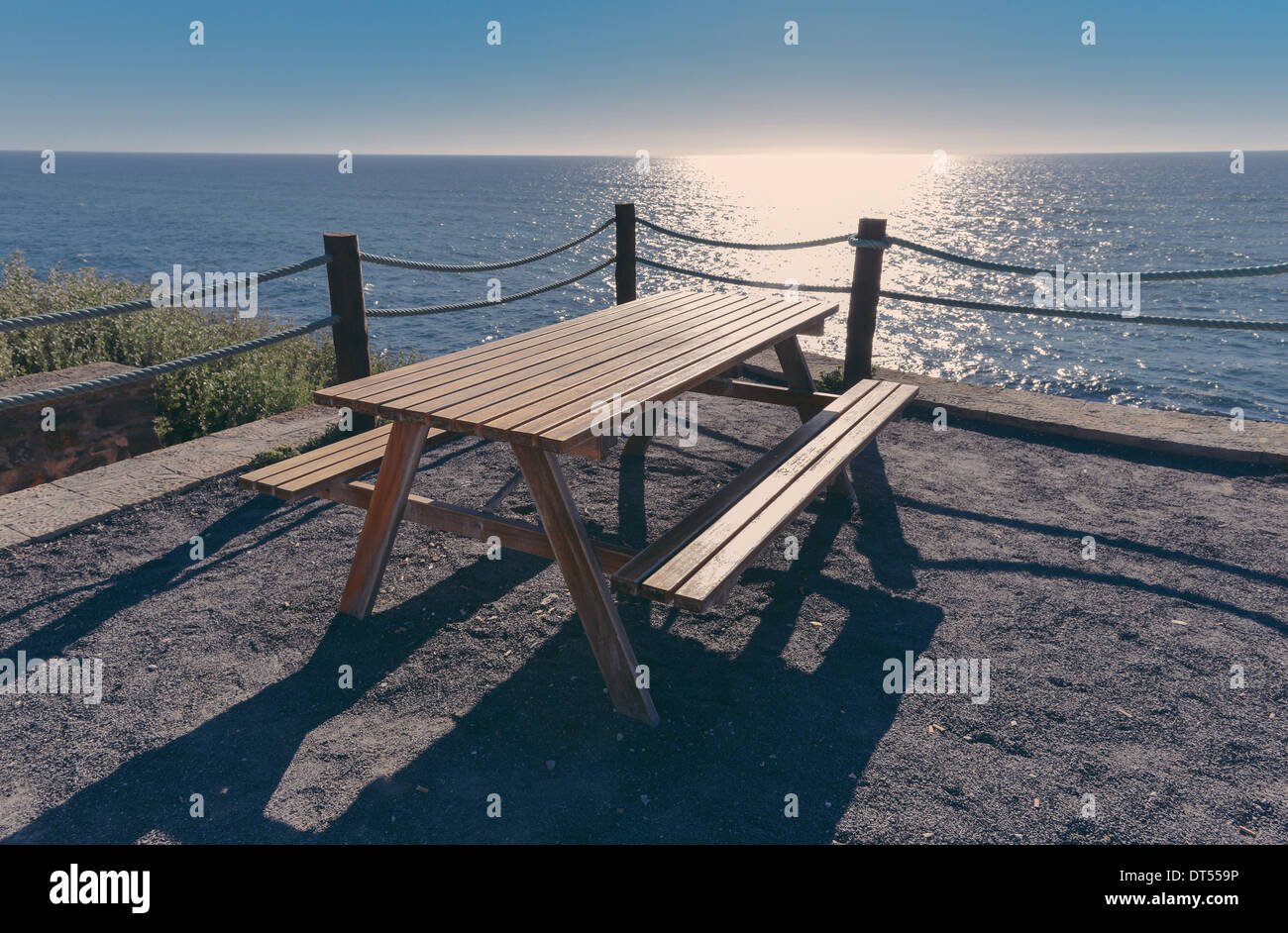 Bench with a view on the sea in the coast of Portugal Stock Photo