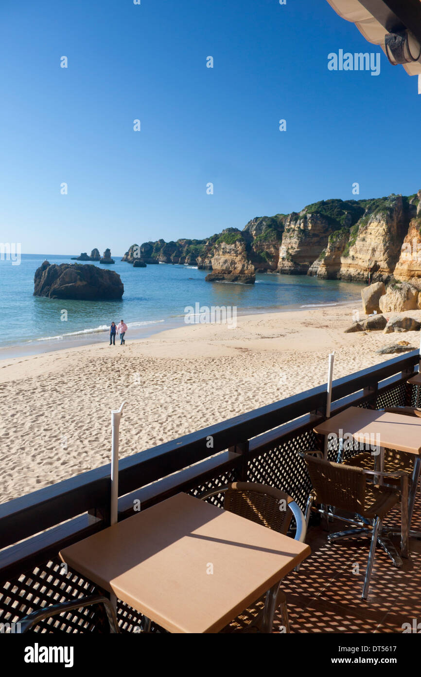 Cafe with tables overlooking Praia Dona Ana beach and cliffs Lagos Algarve Portugal Stock Photo