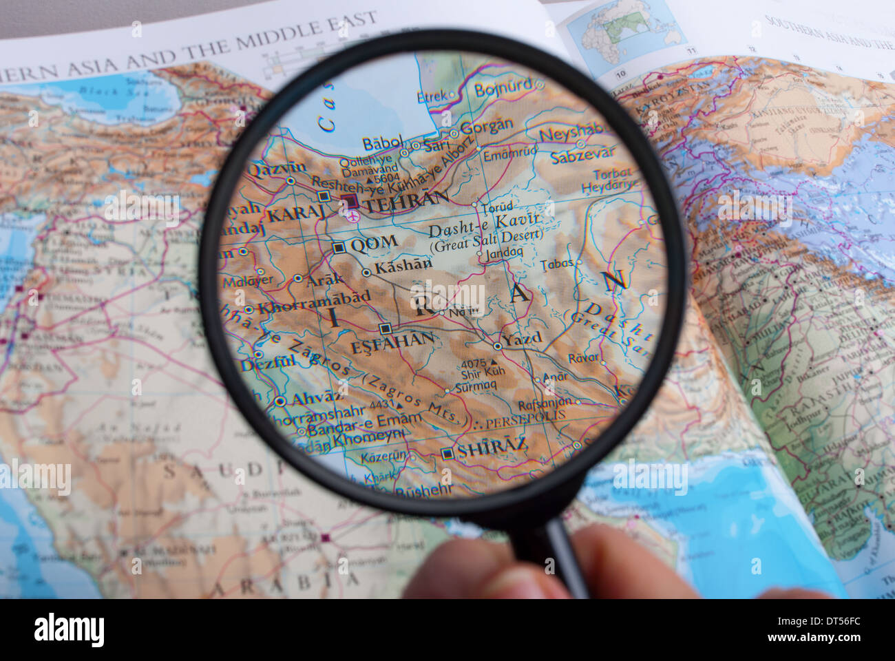 Map of Europe, magnifying glass directed on Iran Stock Photo