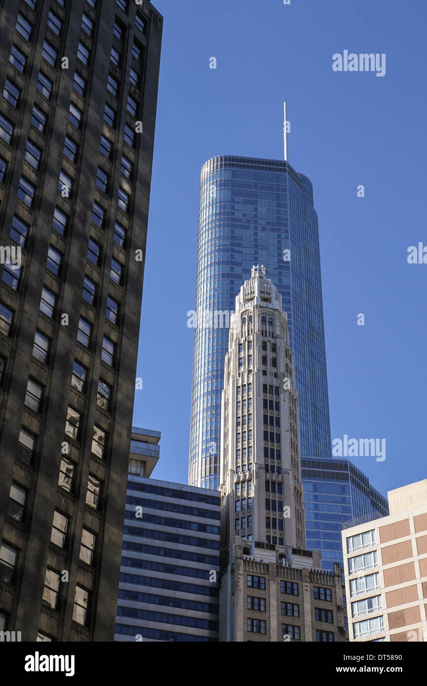 An elegant old tower contrasts with the contemporary architecture of the Trump International Hotel and Tower (completed in 2009) Stock Photo