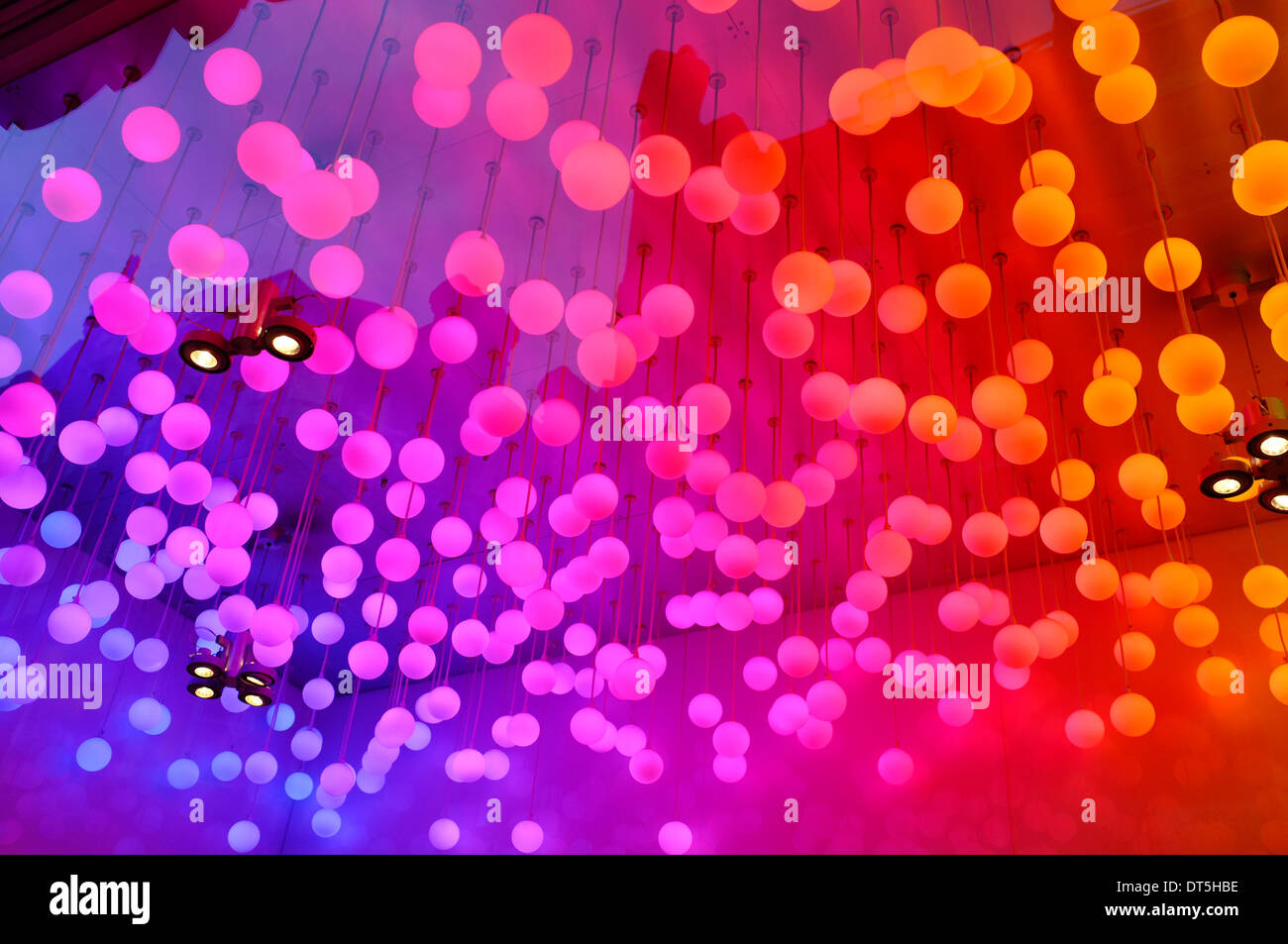 Colourful suspended orb lights of Snog yogurt bar Stock Photo