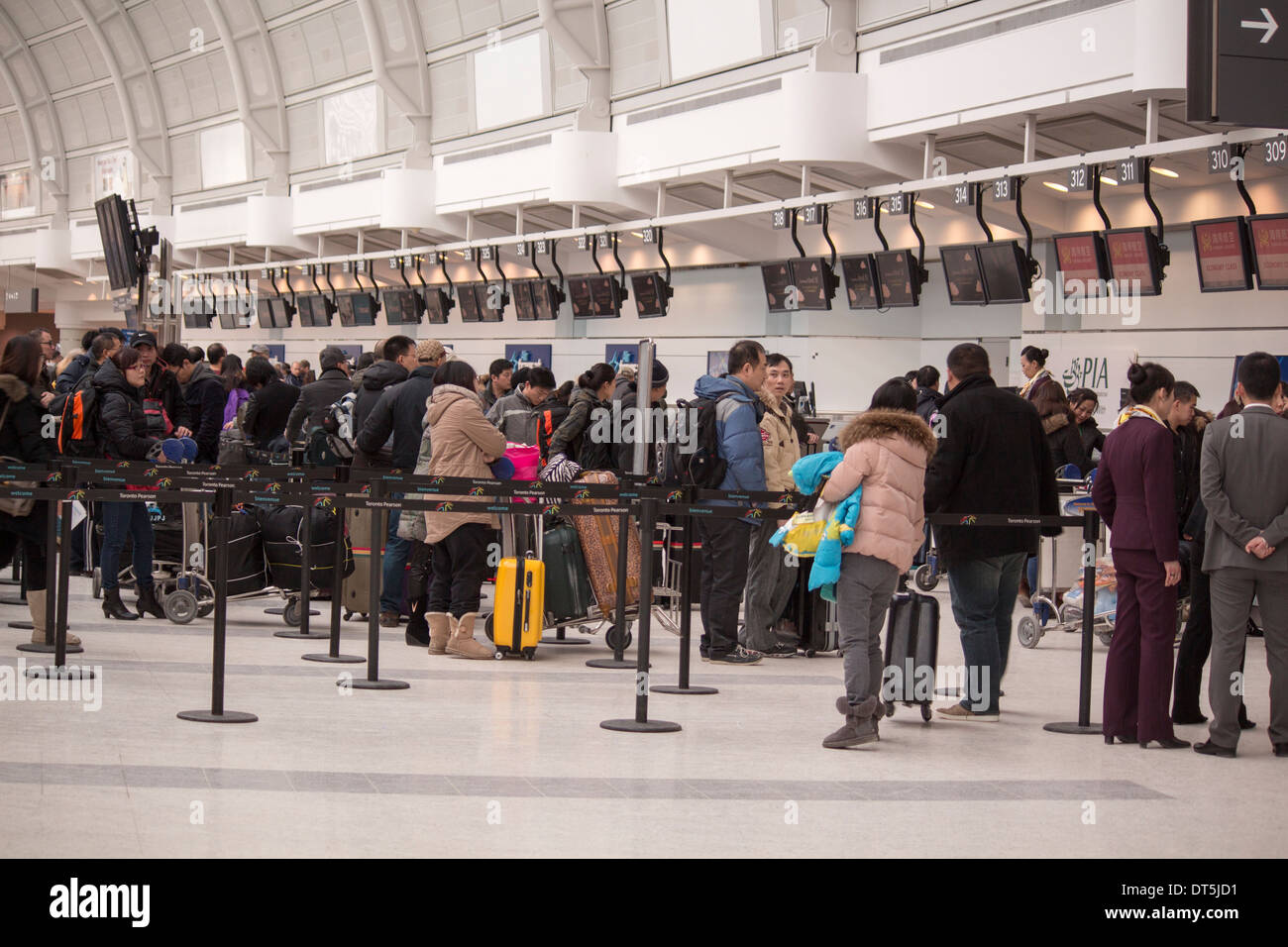 People lined up in a queue at the Air Transat desk in Terminal 3 at Pearson  International Airport in Toronto Ontario Canada Stock Photo - Alamy