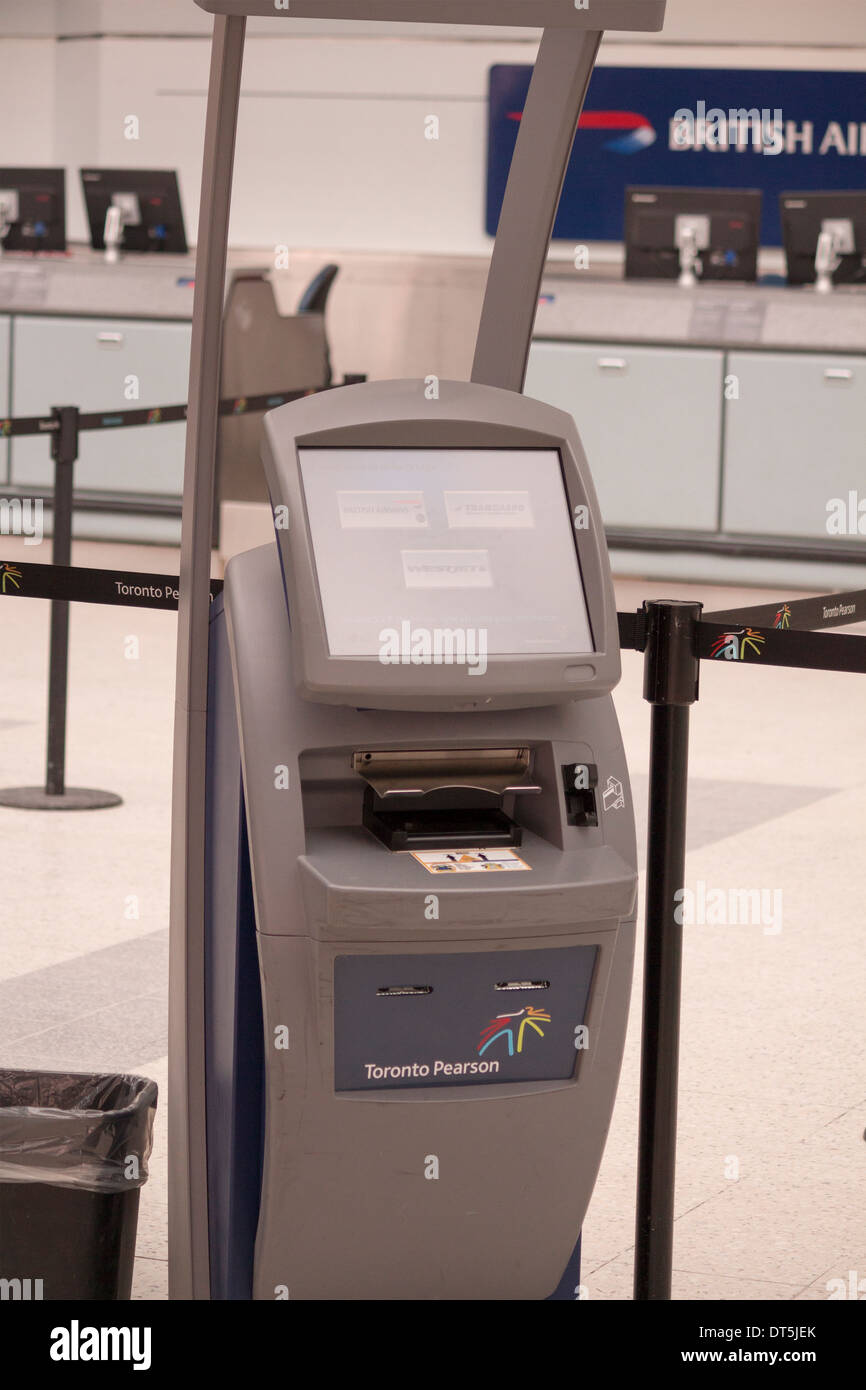 Self Serve ticket machine at Pearson International Airport Serving Westjet, British Airways and Transaero Stock Photo