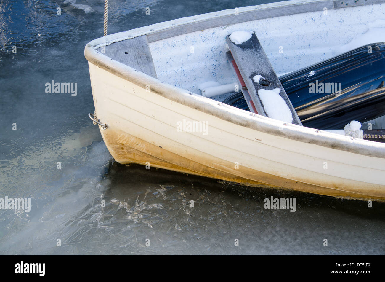Rowing boat stuck in the ice in Annapolis harbor during the polar vortex Stock Photo