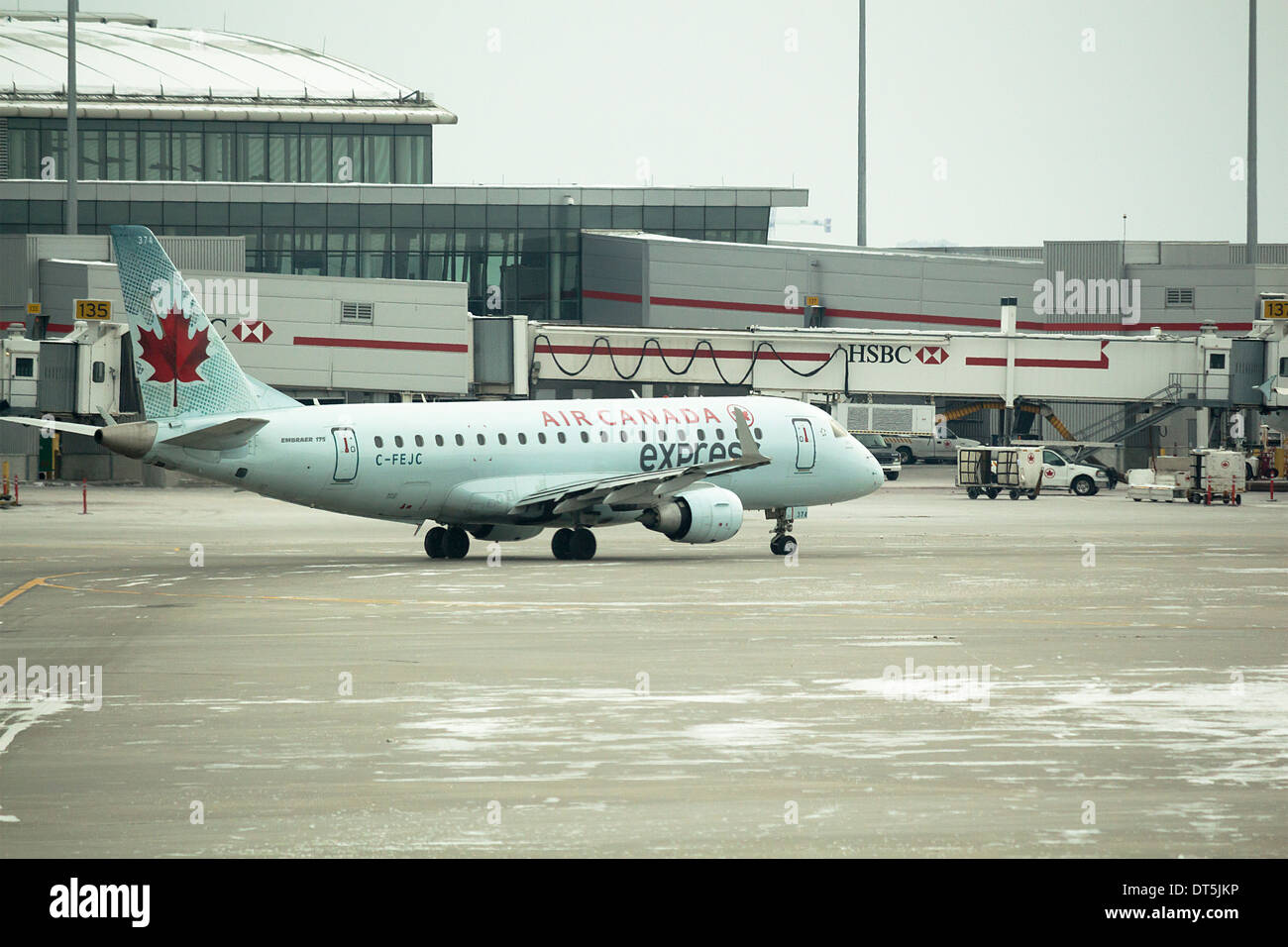 Air Canada Express Embraer 175 Jet on tarmac at Pearson International Airport Stock Photo