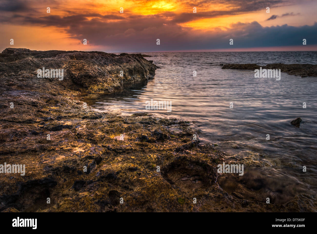 Beautiful sunrise rocky beach hi-res stock photography and images - Alamy