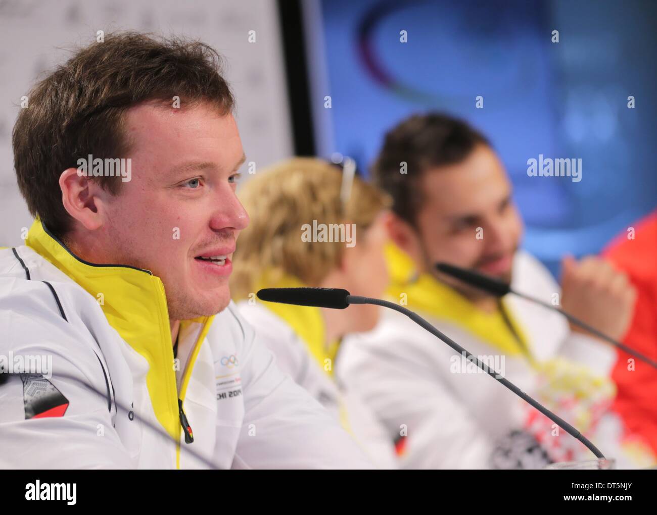 Krasnaya Polyana, Krasnodar region, Russia. 10th Feb, 2014. Felix Loch (L-R) , speed skater Claudia Pechstein, luger Andi Langenhan of Germany and Michael Vesper, Chef de Mission and Head of German Olympic Team, attend a press conference at the Deutsches Haus (German House) in Gorki Village near Krasnaya Polyana, Krasnodar region, Russia, 10 February 2014. Loch won the gold medal in the Luge Men's Singles Run at the Sochi 2014 Olympic Games on 09 February 2014. Photo: Kay Nietfeld/dpa/Alamy Live News Stock Photo