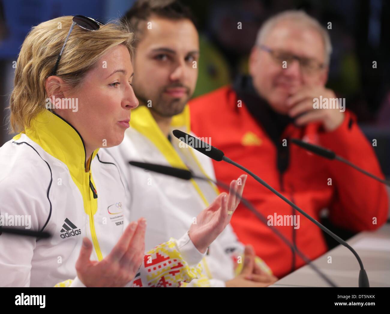 Krasnaya Polyana, Krasnodar region, Russia. 10th Feb, 2014. (L-R) speed skater Claudia Pechstein, luger Andi Langenhan of Germany and Michael Vesper, Chef de Mission and Head of German Olympic Team, attend a press conference at the Deutsches Haus (German House) at the Sochi 2014 Olympic Games in Gorki Village near Krasnaya Polyana, Krasnodar region, Russia, 10 February 2014. Photo: Kay Nietfeld/dpa/Alamy Live News Stock Photo