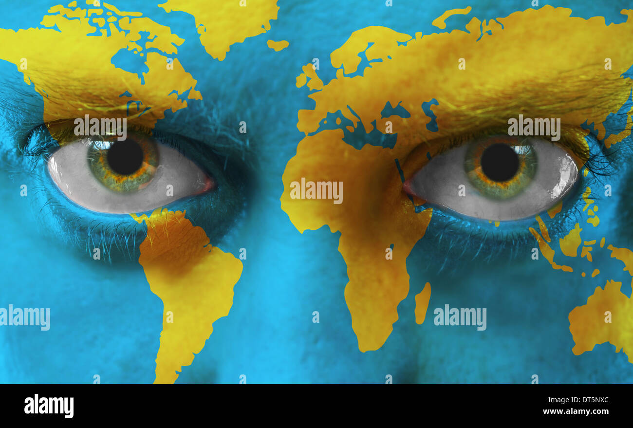 Human face with painted map of world Stock Photo