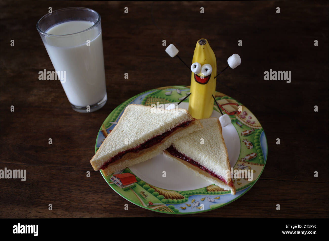 Peanut butter and jelly sandwich, with dancing banana, and a glass of