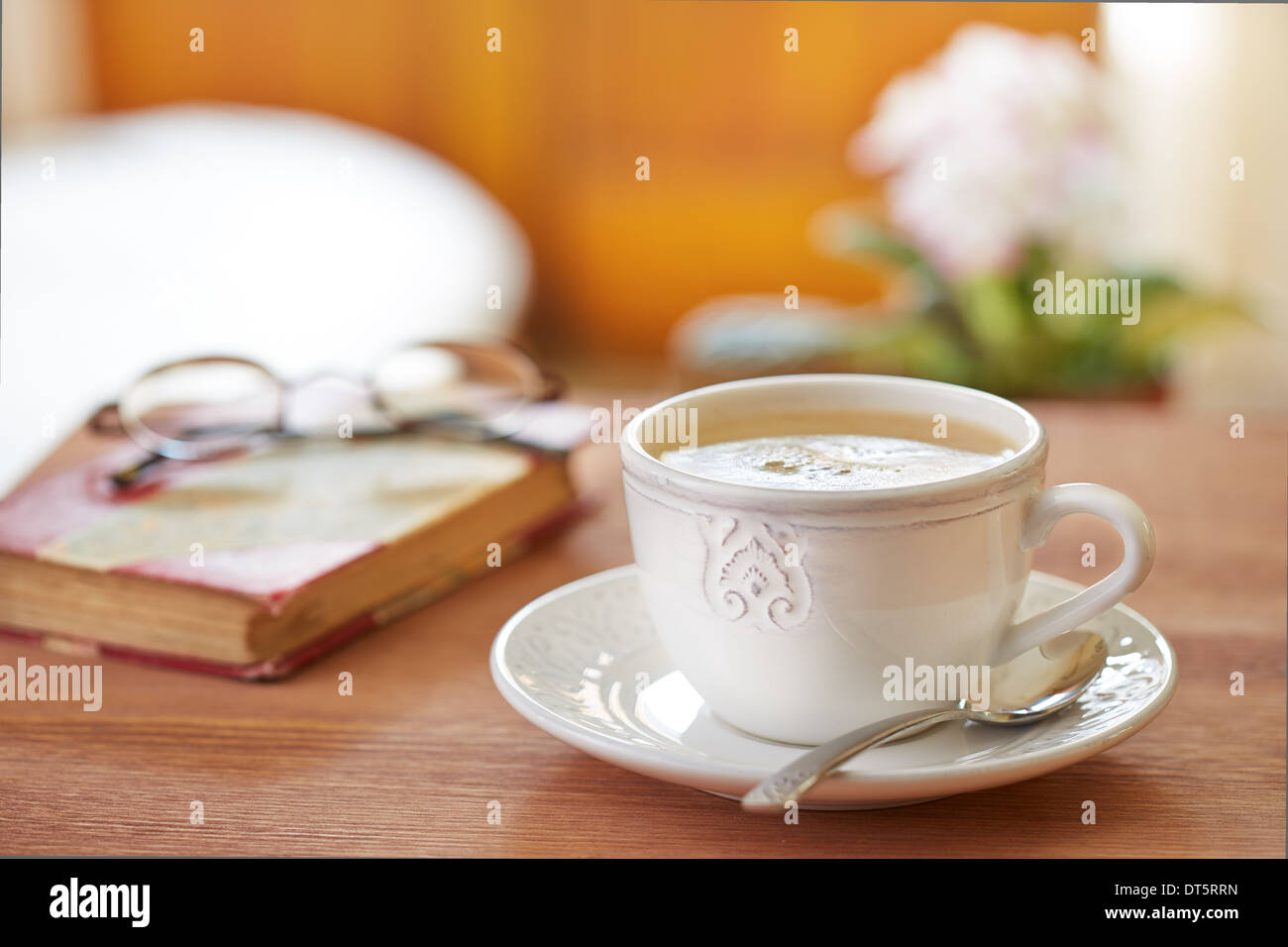 Coffee latte still life with glasses and book Stock Photo