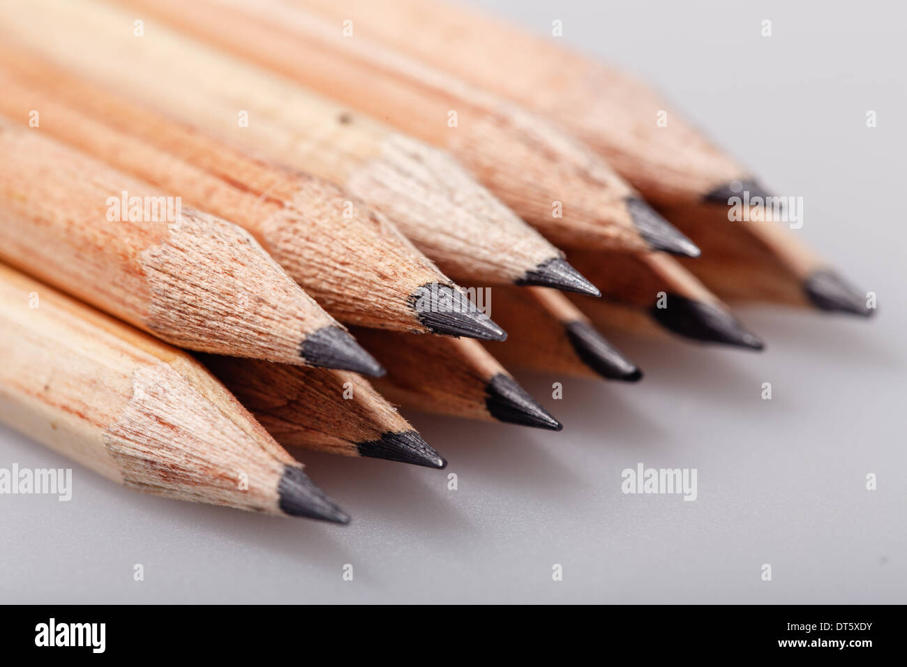 Graphite wooden pencils for sketching shot closeup background Stock