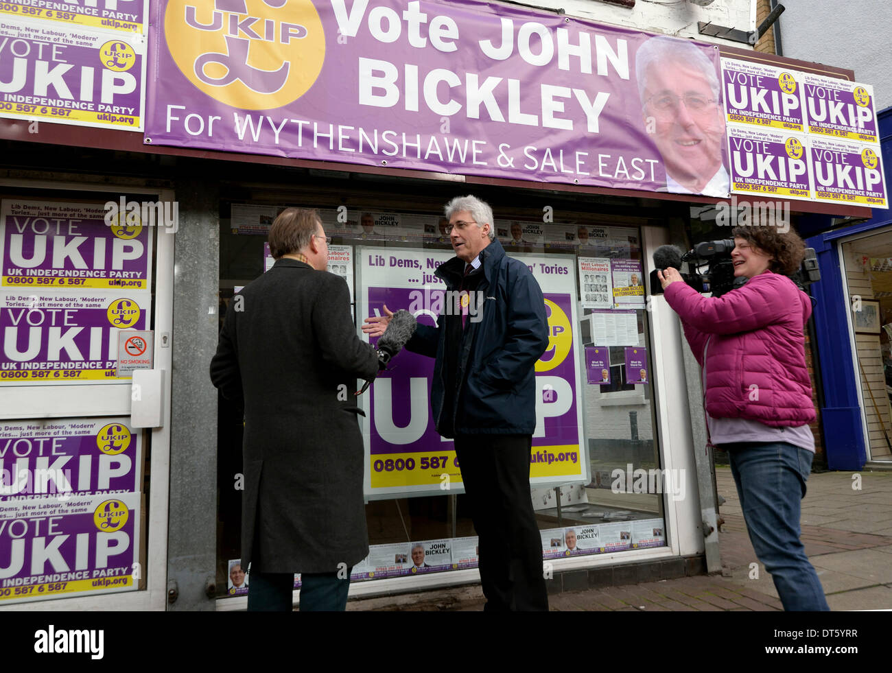 Sale, Manchester, UK. 10th February 2014. John Bickley, the UKIP candidate answers questions from Michael Crick of Channel 4 outside his campaign office in Sale, Greater Manchester, The by-election, to be held on Thursday February 13, is because of the death of Paul Goggins, who died on January 7th. UKIP, Wythenshawe and Sale East By-Election   Greater Manchester, UK  10 February 2014 Credit:  John Fryer/Alamy Live News Stock Photo