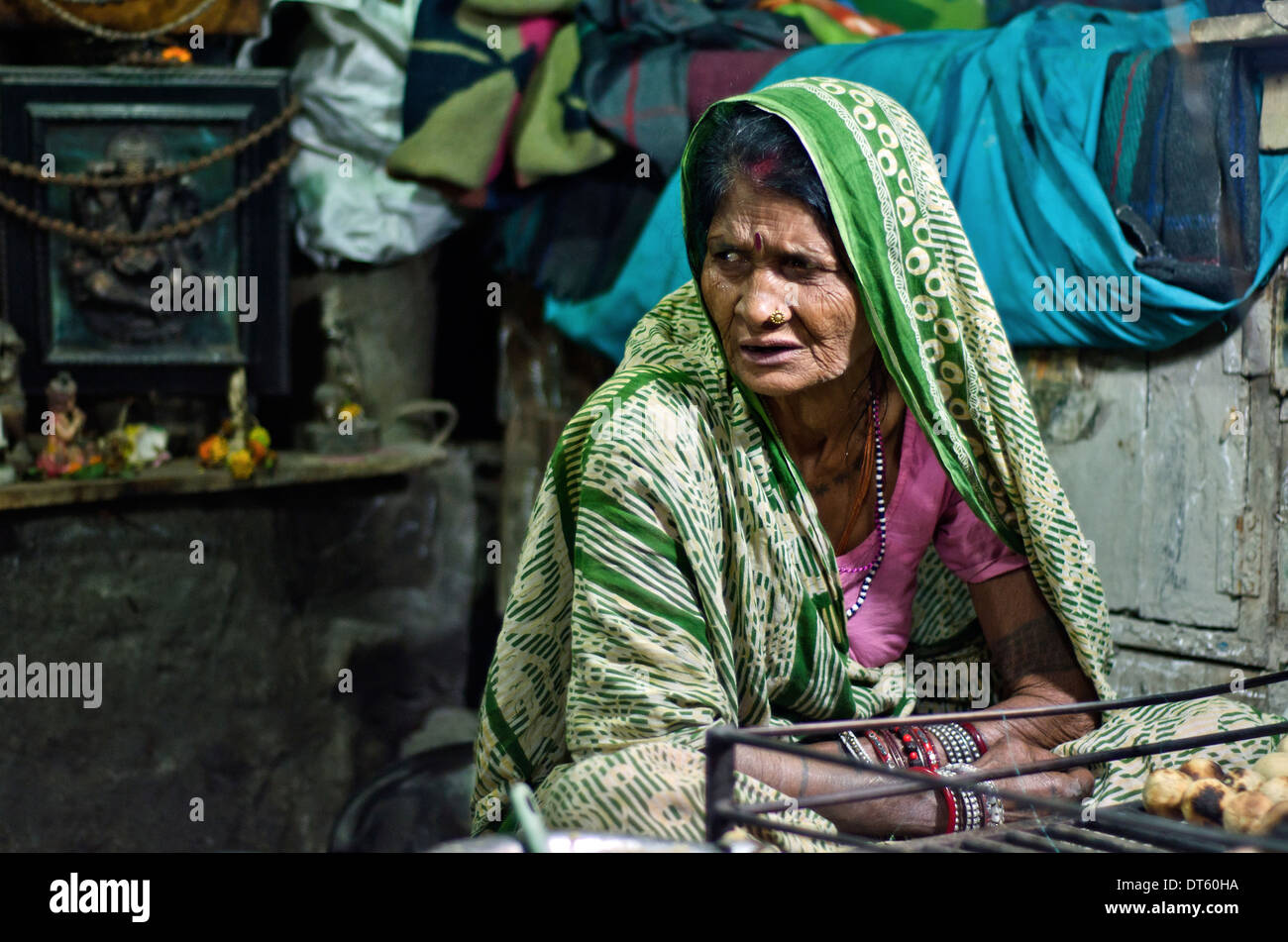 Woman working in the tea shop,Butnath,Kolkata,India Stock Photo