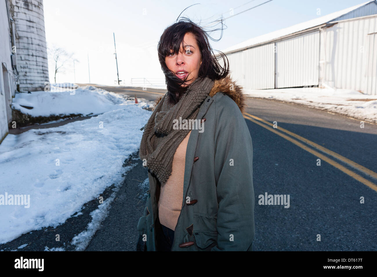 Woman standing outside jacket hi-res stock photography and images - Alamy