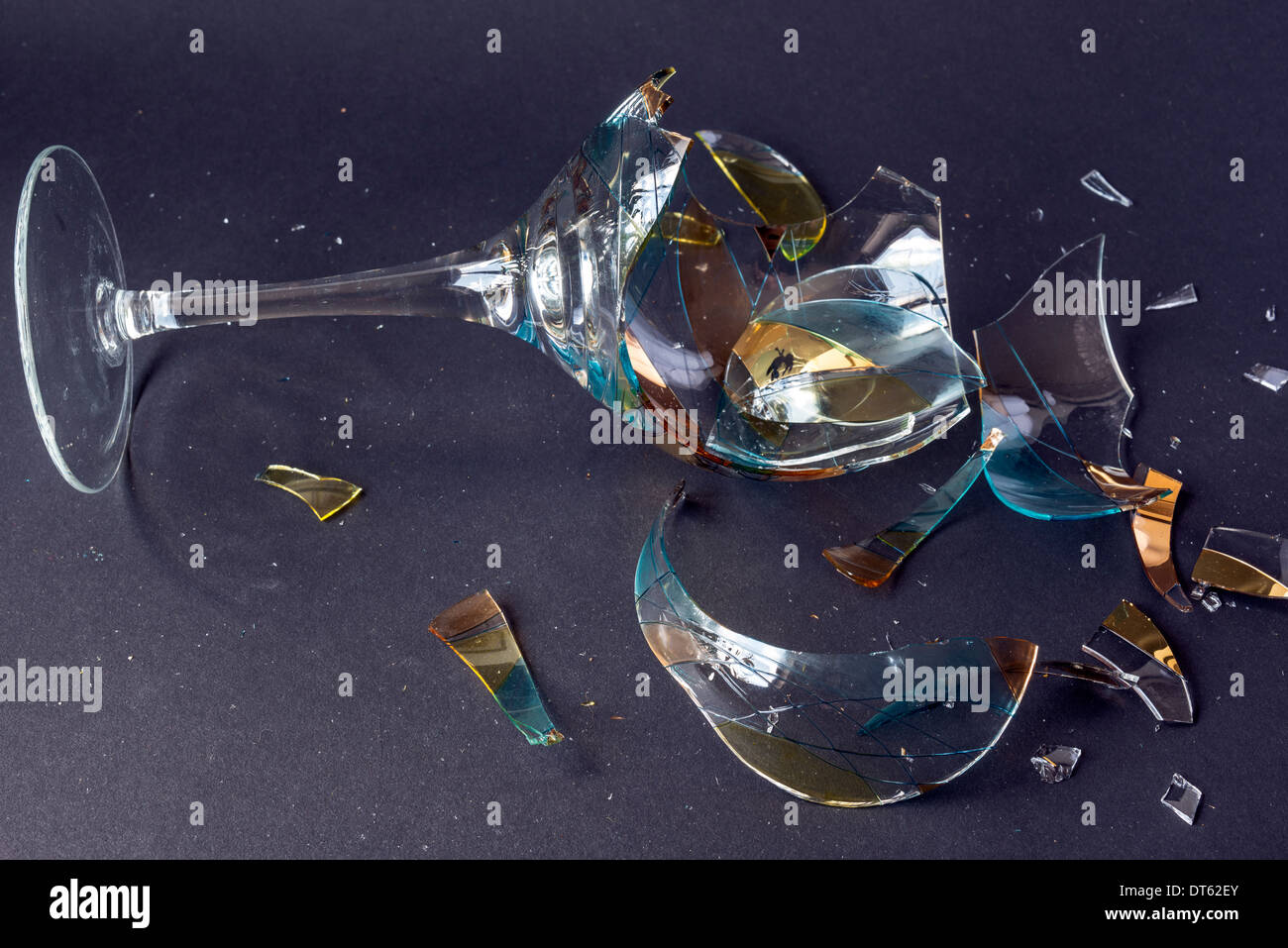 Broken wine glass on black background Stock Photo Alamy