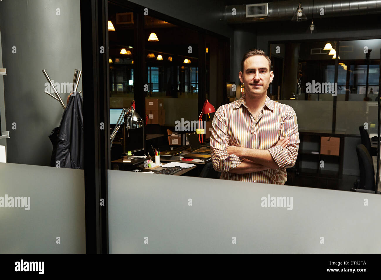 Portrait of businessman with arms folded Stock Photo