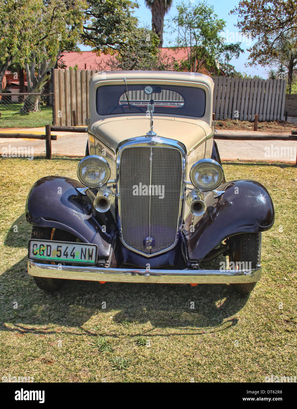 RUSTENBURG, SOUTH AFRICA - SEPTEMBER 9: A beige 1932 Chevrolet Five Window Rumble seat Coupe Stock Photo