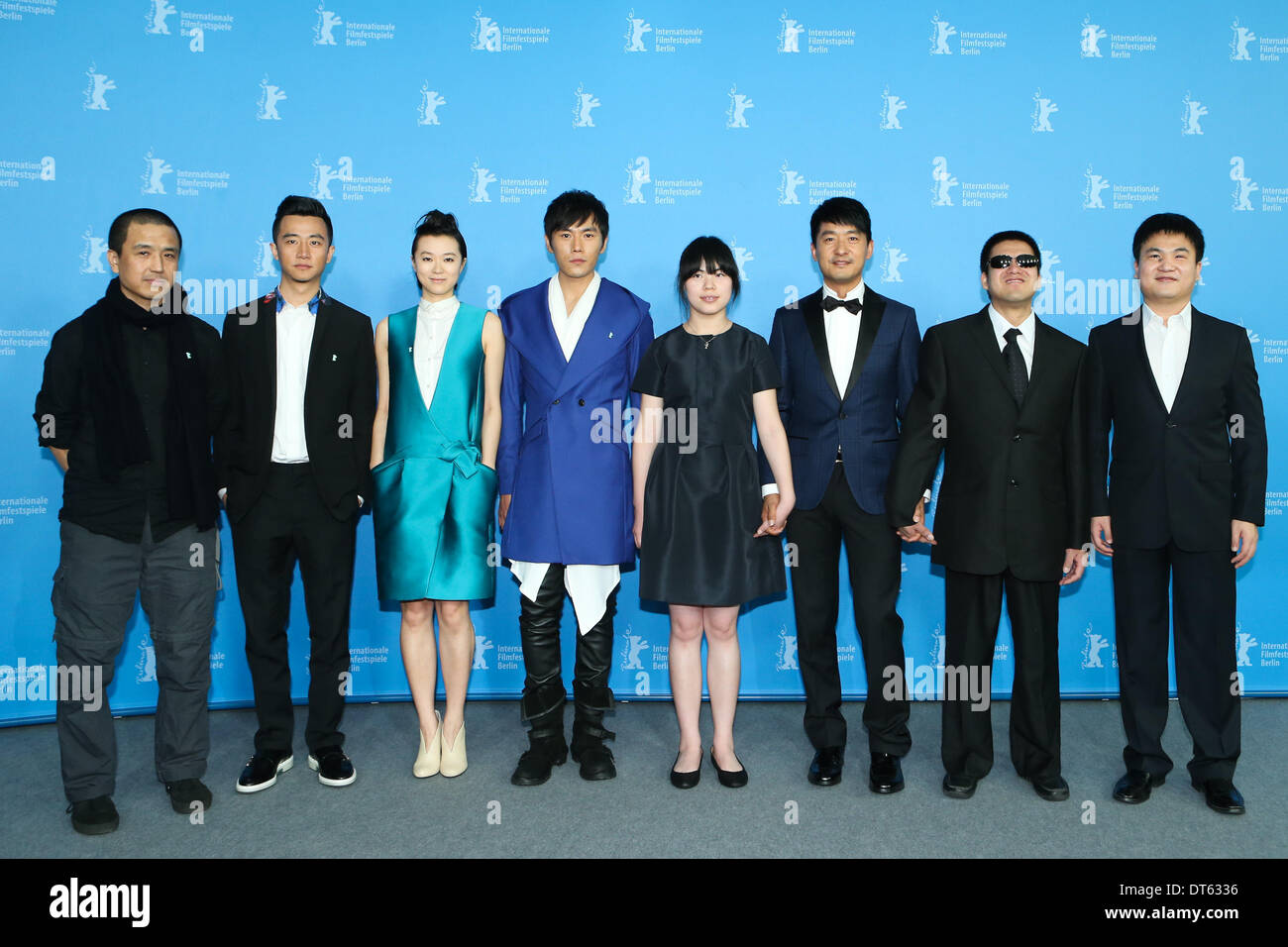 Berlin, Germany. 10th Feb, 2014. Director Lou Ye and actor Huang Xuan, actress Huang Lu, actor Qin Hao, actress Zhang Lei, actor Guo Xiaodong, Mu Huaipeng and Wang Zhihua (from L to R) pose for photos during a photocall to promote the movie 'Blind Massage' at the 64th Berlinale International Film Festival in Berlin, Germany, on Feb. 10, 2014. 'Blind Massage' is one of the three Chinese films vying for prizes in the Competition program. Credit:  Zhang Fan/Xinhua/Alamy Live News Stock Photo