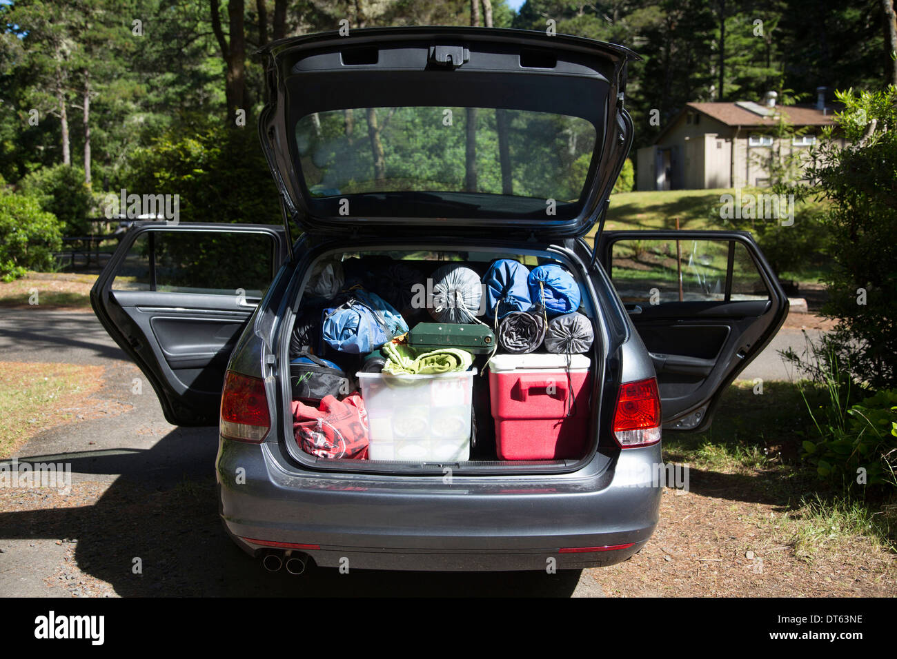 Red Car with with Things for Vacation and Camping. Preparing To