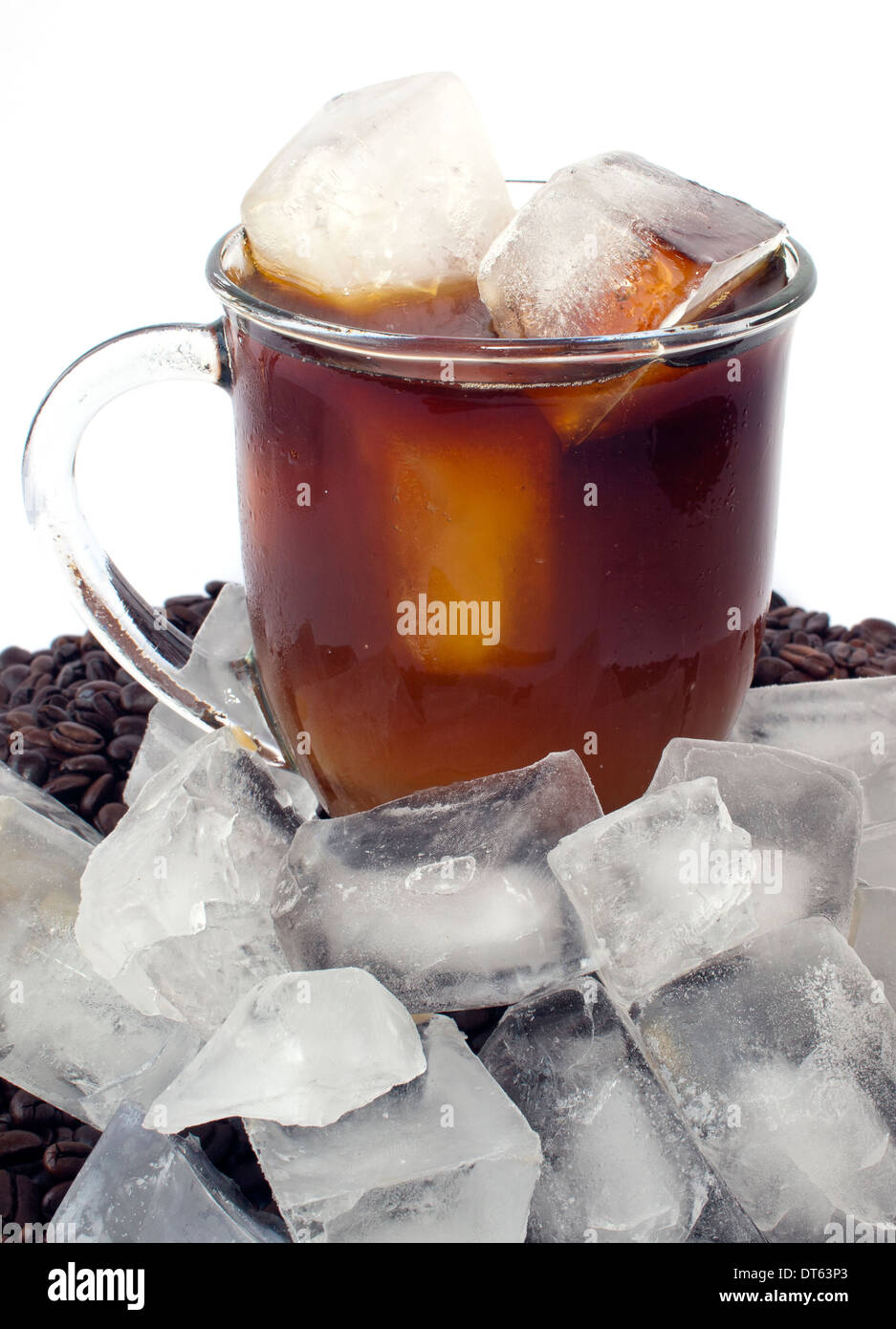 Iced coffee on bed of beans with ice Stock Photo