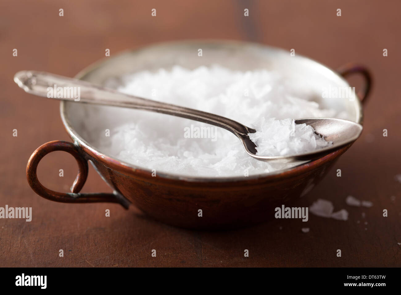 sea salt in vintage bowl and spoon Stock Photo