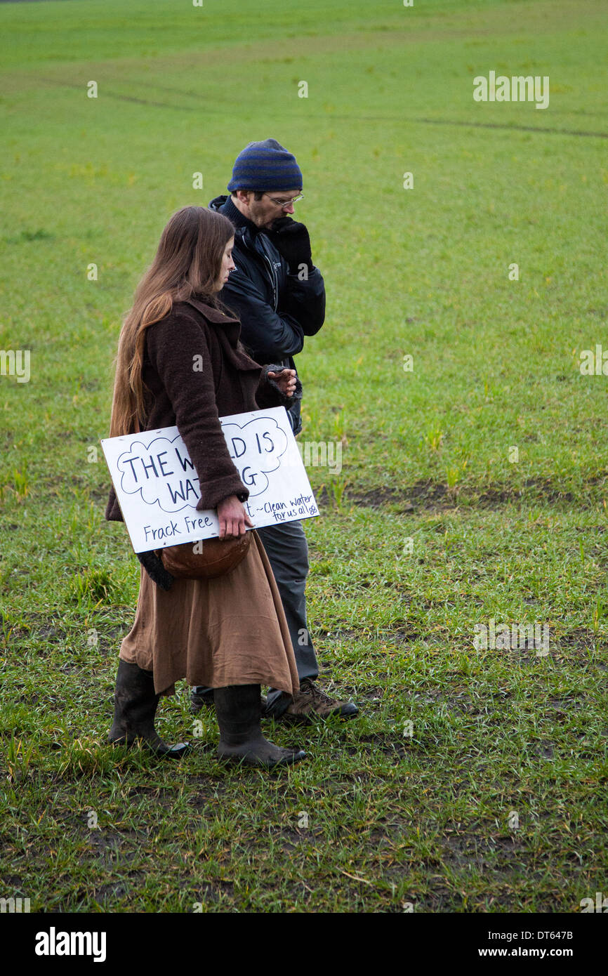 Barton Moss, Manchester, UK. 10th Feb, 2014.  Protests by anti-fracking campaigners and a policing operation by Greater Manchester Police continue at IGAS Drilling Site at Barton Moss. Protestors are seeking to delay and obstruct delivery vehicles and drilling equipment en-route to the controversial gas exploration site. Fracking protestors have set up a camp at Barton Moss Road, Eccles a potential methane-gas extraction site in Salford, Greater Manchester. Credit:  Mar Photographics/Alamy Live News. Stock Photo