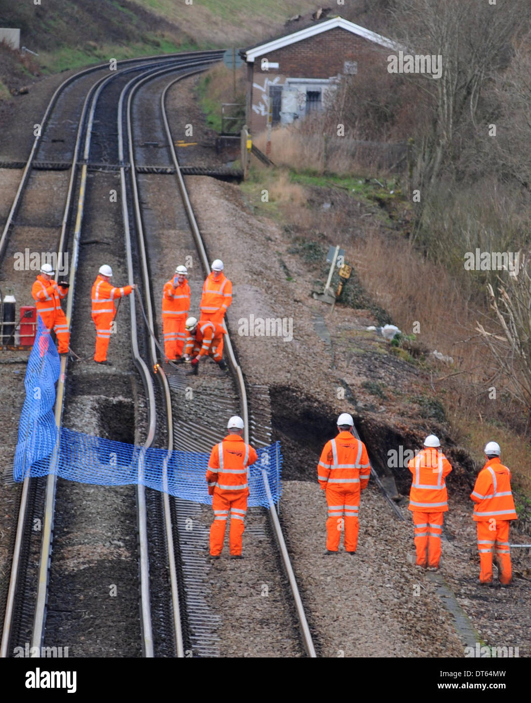 Stonegate, East Sussex, UK. 10th February 2014. Network Rail engineers cutting out damaged rail at the landslip at Stonegate, East Sussex. Engineers advised this is more serious than the slip at Battle and could extend the line closure for some weeks. More heavy rain is forecast. Credit:  David Burr/Alamy Live News Stock Photo