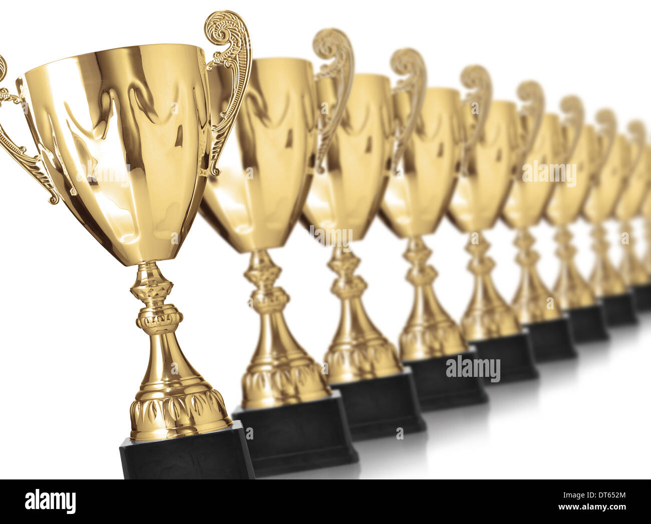 champion golden trophies isolated on white Stock Photo - Alamy