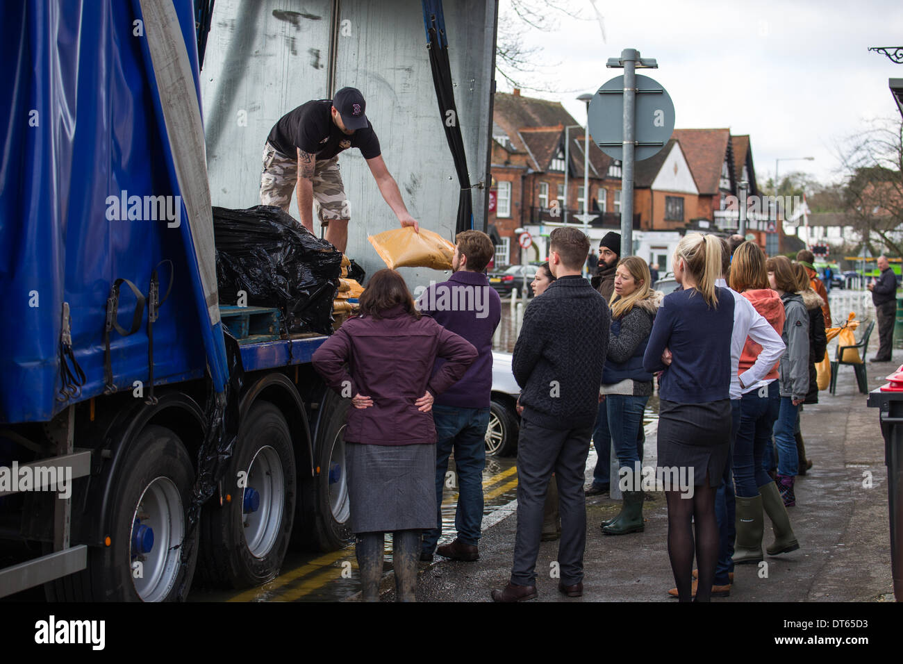Datchet, UK. 10th Feb, 2014. UK Weather.  Flooding in Datchet, Berkshire.   10th February 2014.  Flooding in Datchet.  Sandbags are distributed. Water level keeps rising.   Credit:  Graham Eva/Alamy Live News Stock Photo