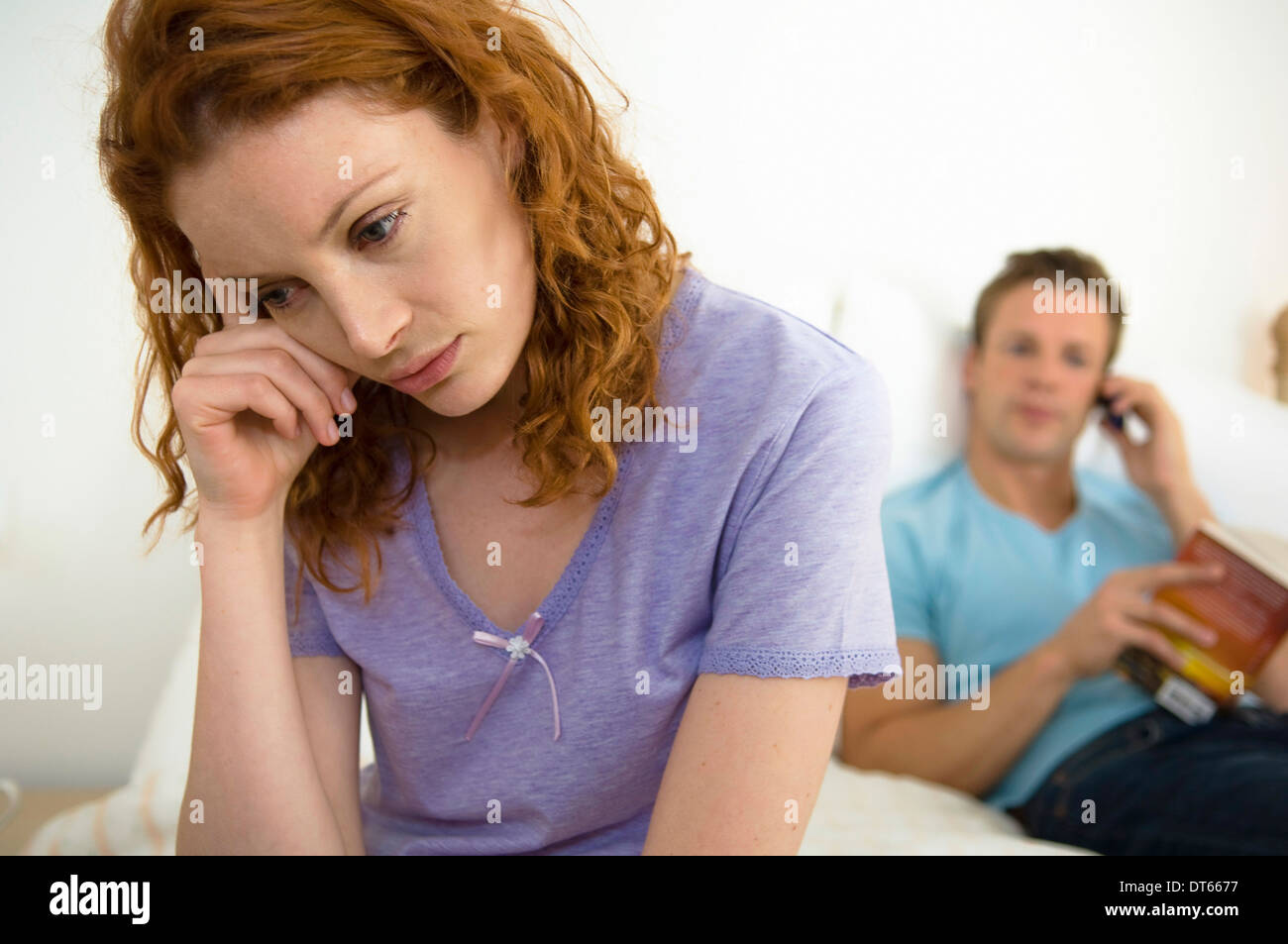 Troubled woman head in hands hi-res stock photography and images - Alamy