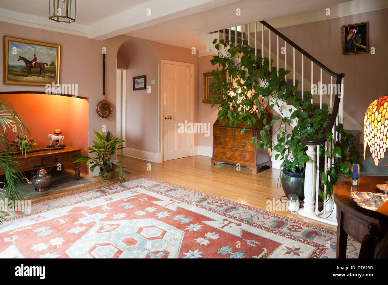 Traditionally furnished entrance hall and staircase. Stock Photo