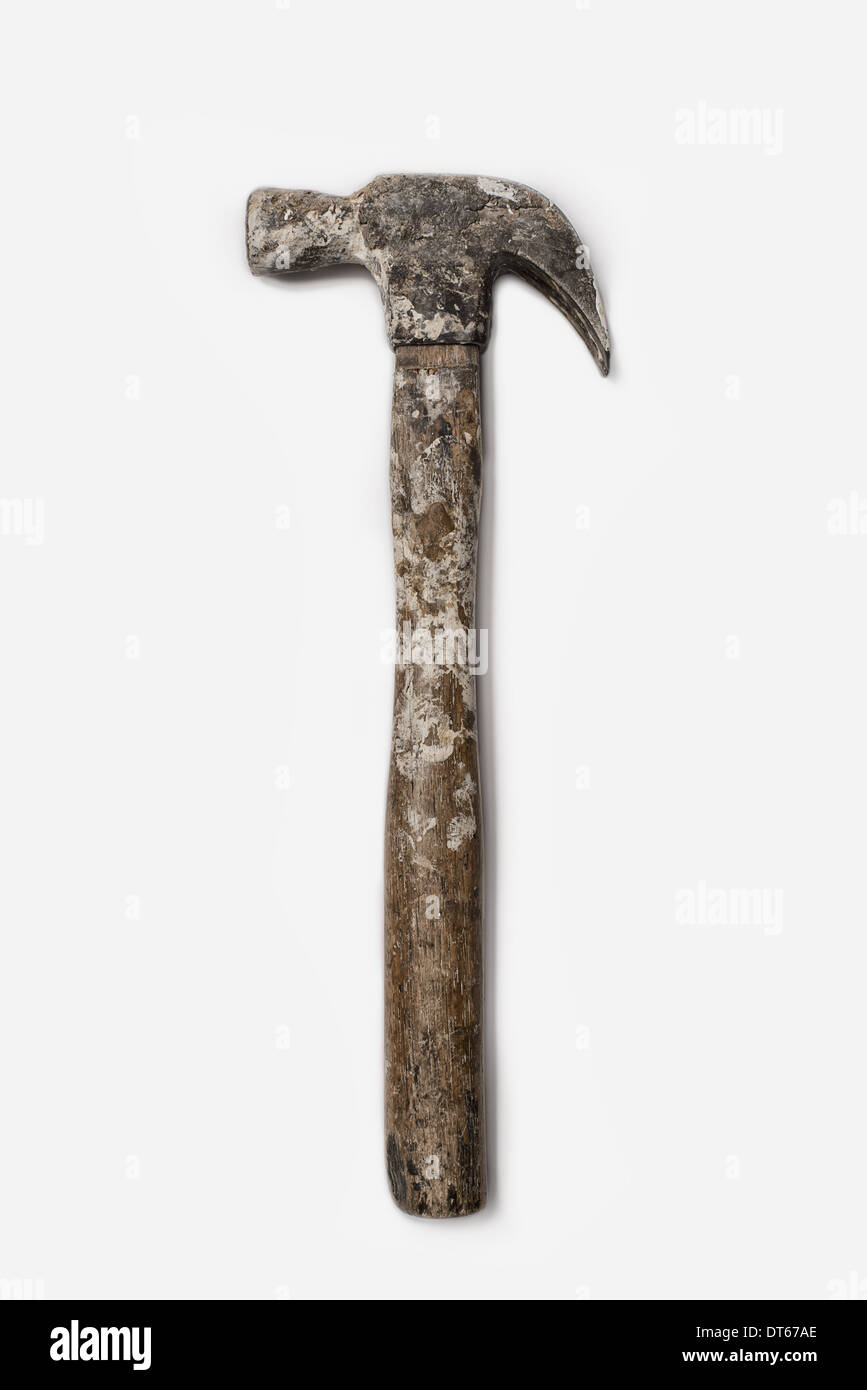 Used Tools. A metal hammer with claw head. A worn marked wooden handle. Stock Photo