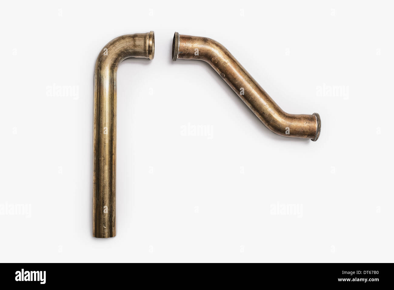 Copper Plumbing Pipe Sections. Two pieces of copper pipe. Shiny formed