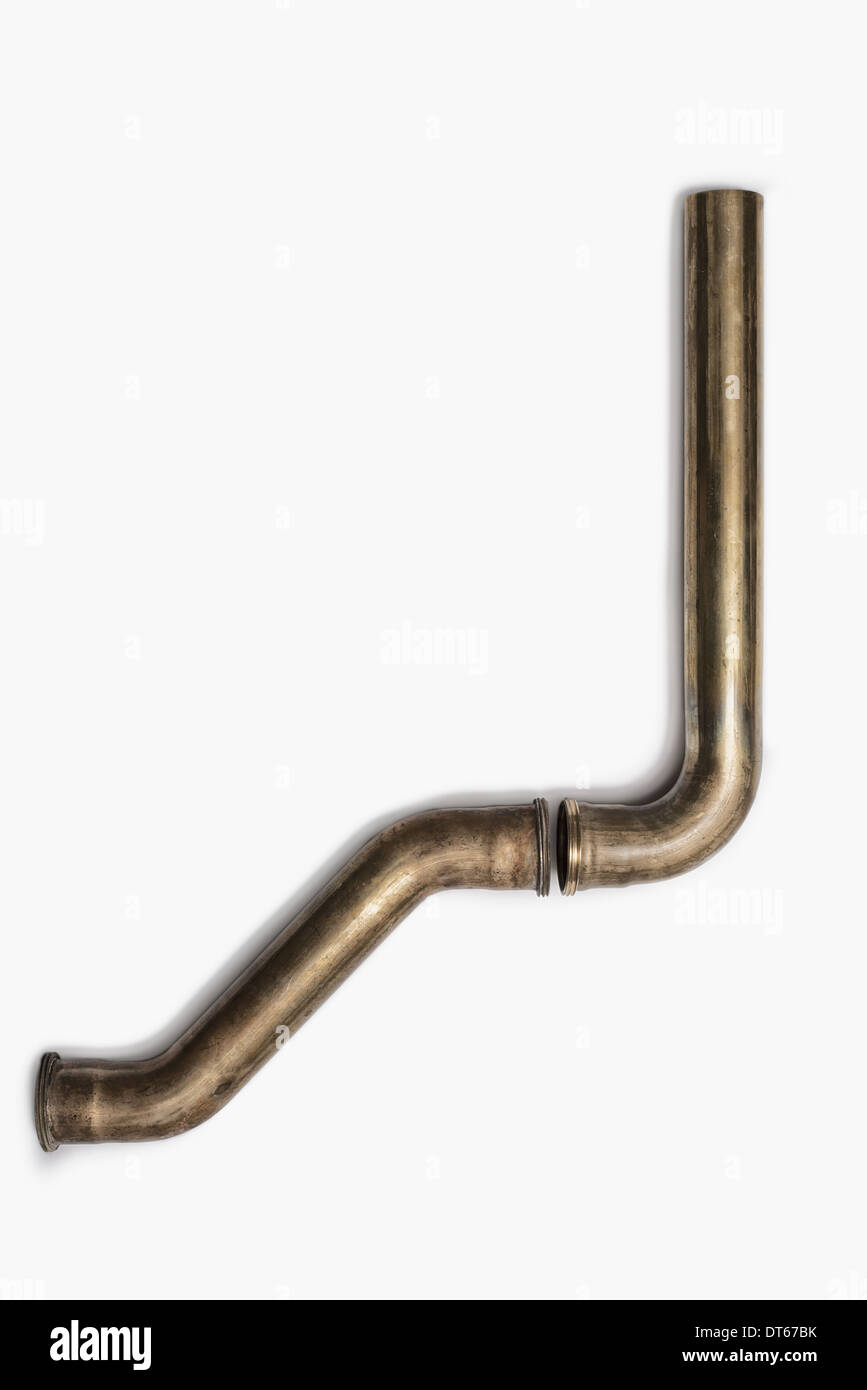 Copper Plumbing Pipe Sections. Two pieces of copper pipe.  Shiny formed shaped pieces. Stock Photo