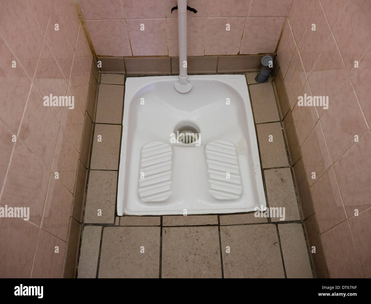Typical French squat toilet Stock Photo