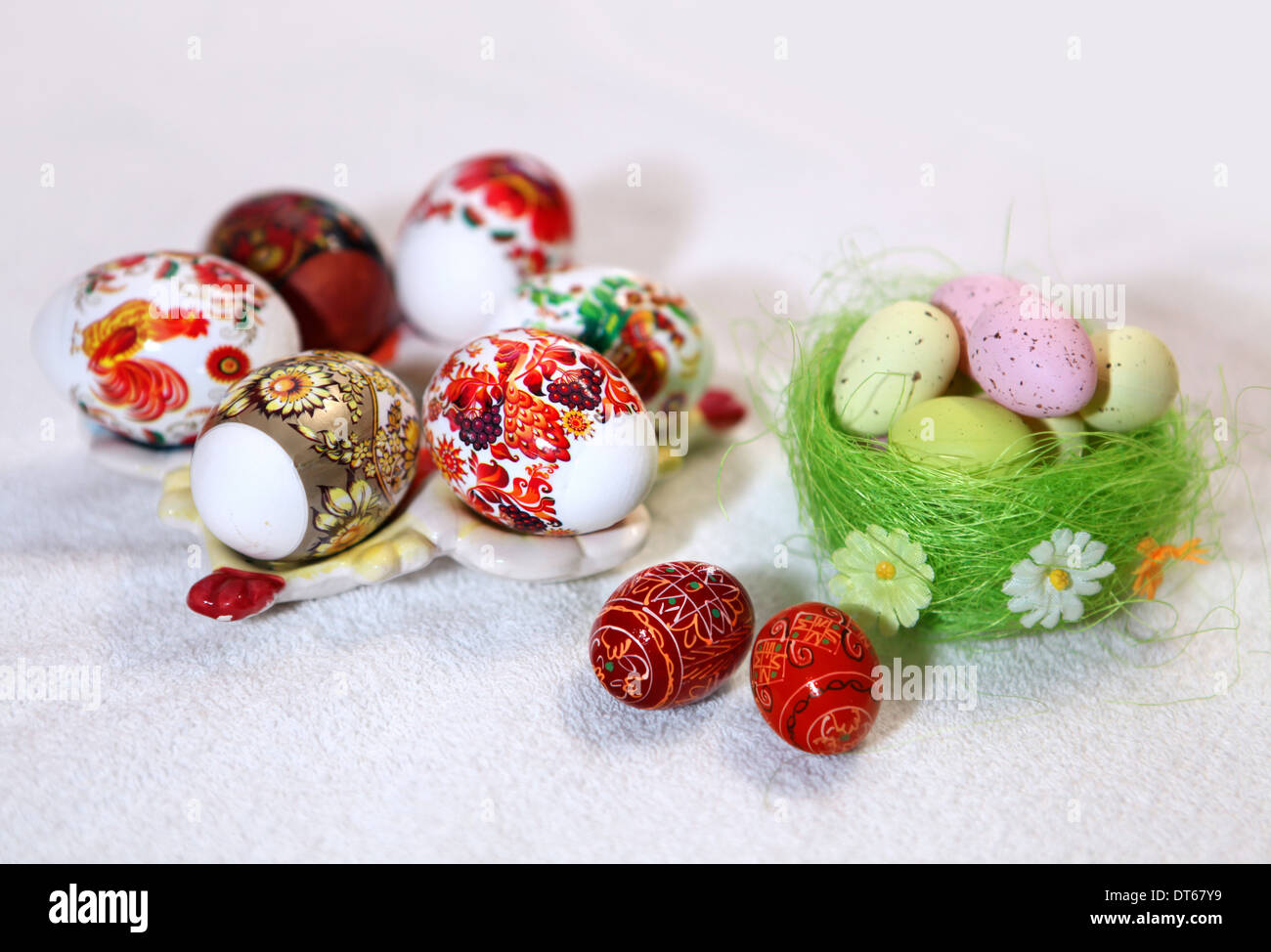 Painted Colorful Easter Eggs on linen fabric Stock Photo